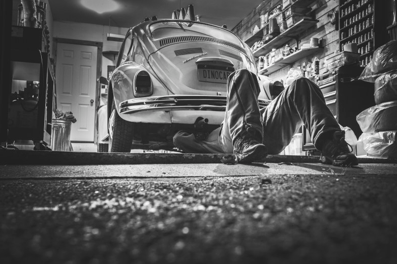 Repairing a car in a garage