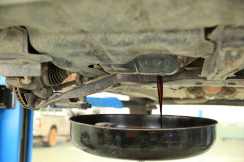 Used Car oil coming out when being disposed turned black